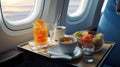 Enjoy snacks and juice served by a welcoming flight attendant