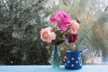 Enjoy some free time on the terrace with roses bouquet Royalty Free Stock Photo