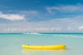 Enjoy summer. Spend vacation exciting occupation st.johns antigua. Sea turquoise water yellow canoe near beach. Extreme Royalty Free Stock Photo