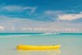 Enjoy summer. Spend vacation exciting occupation st.johns antigua. Sea turquoise water yellow canoe near beach. Extreme Royalty Free Stock Photo