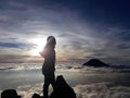 enjoy the sunrise on the top of the indonesian mountain