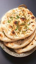 Enjoy Tandoori naan, a classic accompaniment to Indian dishes.