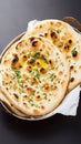 Enjoy Tandoori naan, a classic accompaniment to Indian dishes.