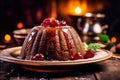 Enjoy the traditional goodness of plum pudding, artfully served on a wooden table. Royalty Free Stock Photo