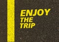 Enjoy the trip written on the road. Royalty Free Stock Photo