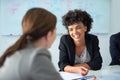 They always enjoy working alongside each other. two businesswomen having a meeting in an office. Royalty Free Stock Photo