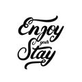 Enjoy your stay hand written calligraphy lettering.