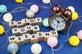 Enjoy Your Weekend alphabet letter and alarm clock decorate with LED cotton ball on blue background