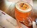 Enjoy Yourself - Glass Tankard Cocktail with Orange Slice on Restaurant Table in London, UK