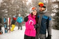 Enjoying in beautiful winter day- couple snowboarder enjoying at Royalty Free Stock Photo