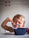 Boy eating breakfast Royalty Free Stock Photo