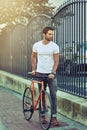 Enjoying the city the modern way. a young handsome man spending the day in the city. Royalty Free Stock Photo