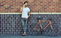 Enjoying the city the modern way. a young handsome man spending the day in the city. Royalty Free Stock Photo