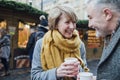 Enjoying Coffee At The Christmas Market