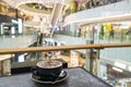 Enjoying coffee in a shopping mall Royalty Free Stock Photo