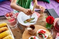 Enjoying dinner child girl eat with knife and fork, dinner table