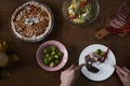 Enjoying dinner with friends. Top view of group of people having Royalty Free Stock Photo