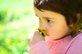 Enjoying every moment. Springtime. weather forecast. Little girl in sunny spring. face skincare. allergy to flowers Royalty Free Stock Photo