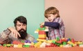 Enjoying every moment together. love. child development. happy family leisure. father and son play game. building with Royalty Free Stock Photo