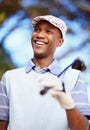 Enjoying a fine day on the green. a confident african american golf player holding a driver. Royalty Free Stock Photo