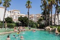 Enjoying free time a pool under a sunny and blue sky during summer Royalty Free Stock Photo