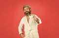 Enjoying fresh coffee. Every morning begins with coffee. Bachelor in bathrobe. Man with beard in dressing gown. Guy in Royalty Free Stock Photo