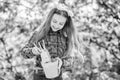 Enjoying her work with plants. spring village country. little girl kid in forest. little girl with gardening tools