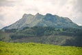 Enjoying hiking in scenic landscape with colorful view of trois couronnes on atlantic coast, basque country, france