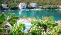 Enjoying holiday at balcony with view - palms, swimming pool, Bay and surrounding Royalty Free Stock Photo