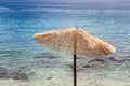 Enjoying the holiday: Sunshade and clear water, beach, Croatia