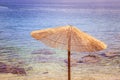 Enjoying the holiday: Sunshade and clear water, beach, Croatia