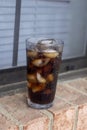 Enjoying an ice cold glass of diet coke in the summer weather Royalty Free Stock Photo