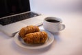 Enjoying job wit a cup coffee and snacks Royalty Free Stock Photo