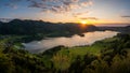 Enjoying the last sunlight over Lake Schliersee in bavarian mountain range. Royalty Free Stock Photo