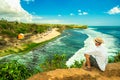 Enjoying life. Back side of young man looking at the sea, vacations lifestyle concept Royalty Free Stock Photo