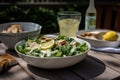 enjoying the perfect summer day with chicken caesar salad and refreshing lemonade