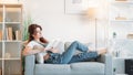 Enjoying reading inspired woman home relax room Royalty Free Stock Photo