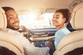 Enjoying road trip together. Young couple driving car Royalty Free Stock Photo