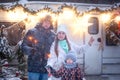 Enjoying spending time together. Family concept. Happy family with sparklers in their hands celebrating Christmas in the winter Royalty Free Stock Photo