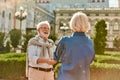 Enjoying time together. Beautiful senior couple smiling and dancing outdoors on a sunny day Royalty Free Stock Photo