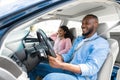 Happy black couple enjoying long drive on a car Royalty Free Stock Photo