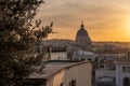 Enjoying the wonderful colors of sunset on the roofs of Rome Royalty Free Stock Photo