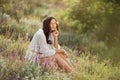 Beautiful carefree woman in fields being happy outdoors Royalty Free Stock Photo