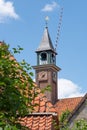 Enkhuizen, Netherlands. June 2022. The church and drawbridge of the Zuiderzee Museum in Enkhuizen.