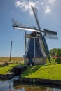 Enkhuizen, Netherlands, June 2022. The mill on the grounds of the Zuiderzee Museum in Enkhuizen.