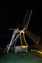 Enkhuizen, Netherlands. October 2022. The illuminated windmill near Enkhuizen. Royalty Free Stock Photo