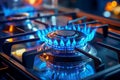 An enlarged image of a blue flame on a gas stove in a home kitchen