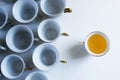 Enlighten others.A concept represented of coffee cups, one full of `ideas` and the other empty Royalty Free Stock Photo