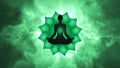 Silhouette of the person meditating activate the heart chakra