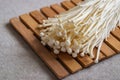 Enoki mushroom, Golden needle mushroom on wooden board